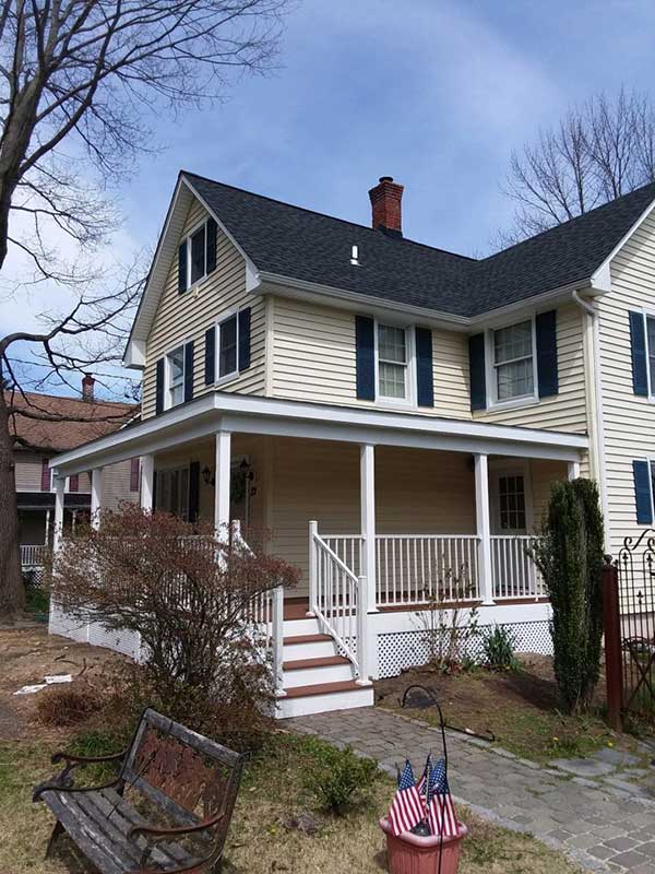 Covered Front Porch Gaf Timberline Hd Charcoal Roof With Azek Tongue Groove Porch Flooring Mahogany With Trex White Metal Railings