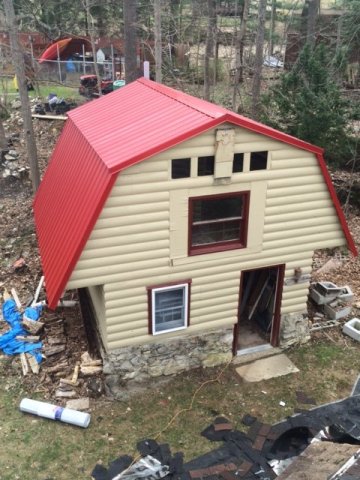 Red Standing Seam Metal Roof Installation